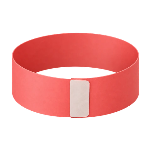 A red paper strip curled into a loop, with the glue tab held under one end